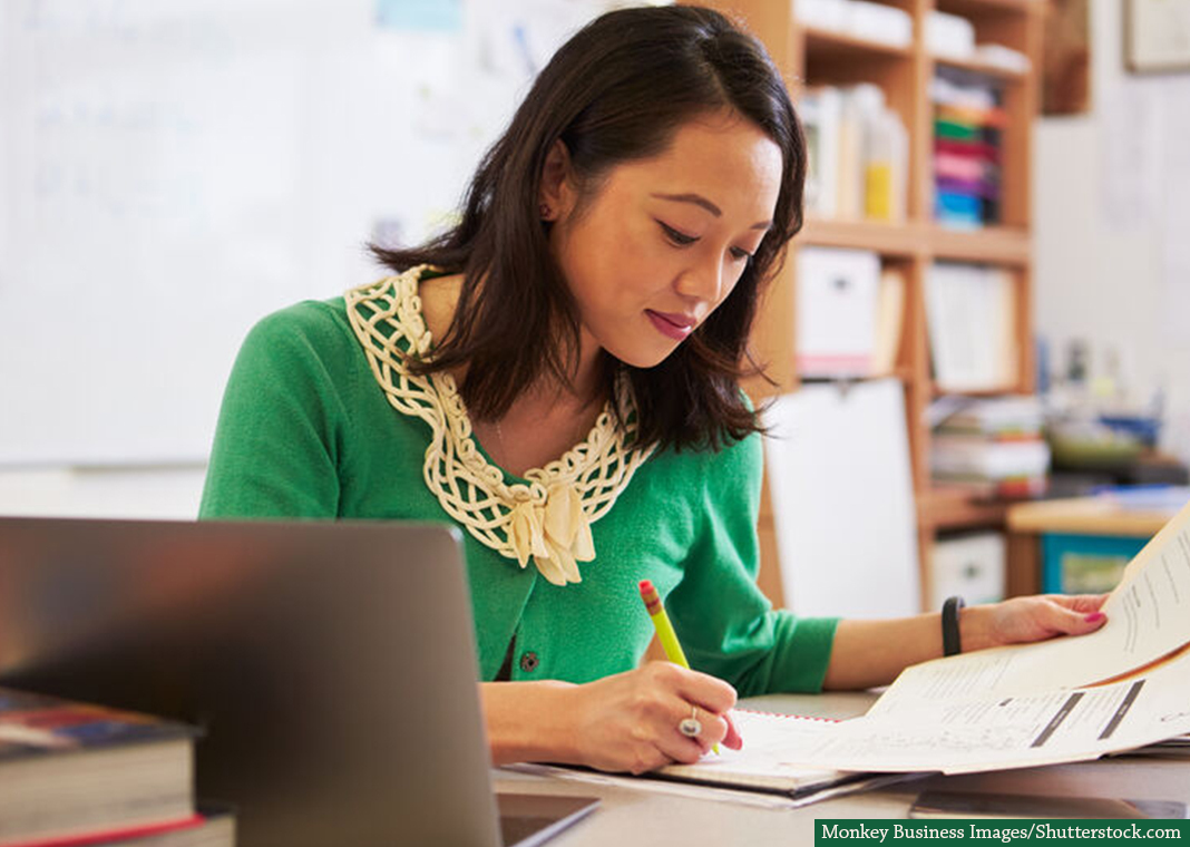 catechist reviewing notes - Monkey Business Images/Shutterstock.com